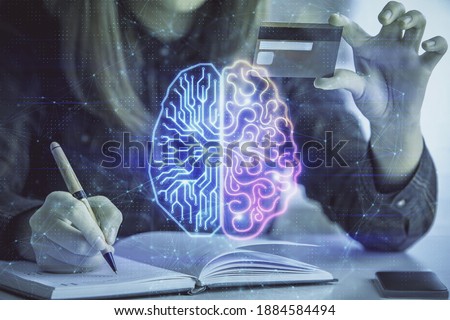 Double exposure of woman on-line shopping holding a credit card and brain hologram drawing. Data E-commerce concept.