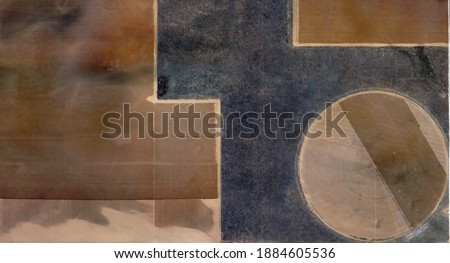 the rusted earth, United States, abstract photography of relief drawings in fields in the U.S.A. from the air, Genre: abstract expressionism, abstract expressionist photography, 