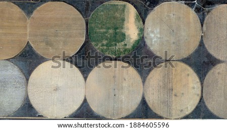the rusted earth, United States, abstract photography of relief drawings in fields in the U.S.A. from the air, Genre: abstract expressionism, abstract expressionist photography, 