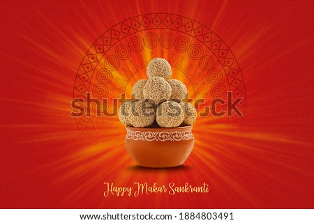 Indian sweet for traditional festival makar sankranti , Rajgira laddu made from Amaranth seed in Bowl on red background Royalty-Free Stock Photo #1884803491