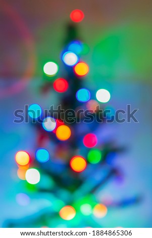Bokeh light on the Christmas tree,A blurry christmas tree,Christmas and New Year decorations.