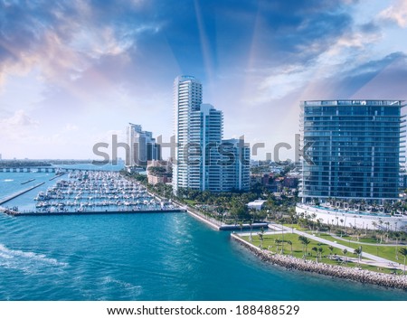 City of Miami Florida, colorful night panorama of downtown business and residential buildings. Vintage filter