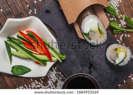 Still life. Japanese cuisine- roll in a package. Flat lay