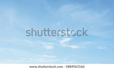 Background picture bright blue sky with thin white clouds