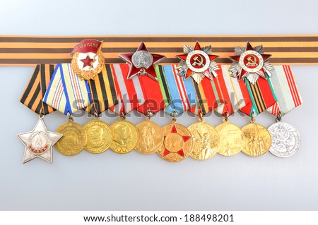 Medals and orders of Great Patriotic war with Saint George Ribbon on gray