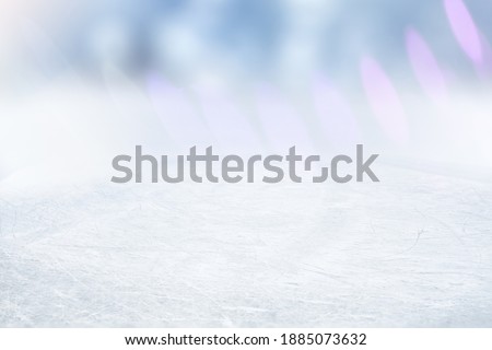 COLD WINTER BACKGROUND WITH EMPTY ICE FIELD, SNOW AND SOFT BOKEH LIGHTS, BACKDROP FOR MONTAGE