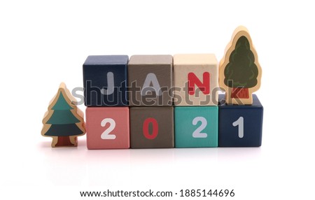 January 2021 inscription in color letters on wooden blocks social network concept