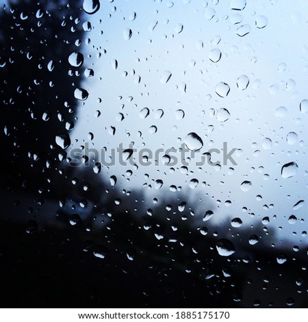 Rain drops on a car window.