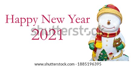 Smile snowman in snow wearing red hat and scarf.Smile snowman in snow wearing  green glove.snowman doll with"merry chrismas" word on white background with "HAPPY NEW YEAR 2021"word and clipping path.