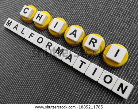 Chiari Malformation, word cube with background. Royalty-Free Stock Photo #1885211785