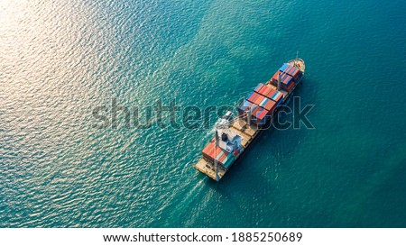 Aerial top view container ship with crane bridge for load container, Business global company commercial trade logistics import export, Freight shipping cargo vessel transportation. Royalty-Free Stock Photo #1885250689