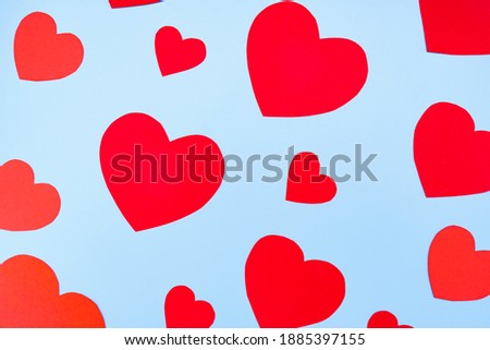 Valentine's Day background. Hearts on pastel blue background. Valentines day concept. Flat lay, top view, copy space