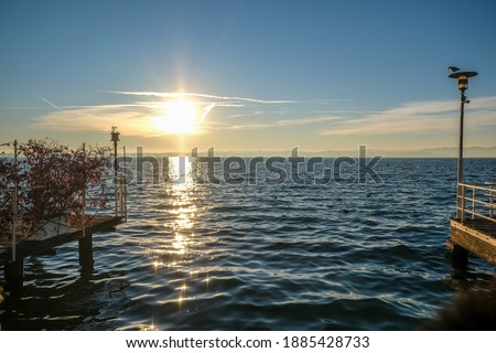 sirmione pier on lake garda at sunset. High quality photo
