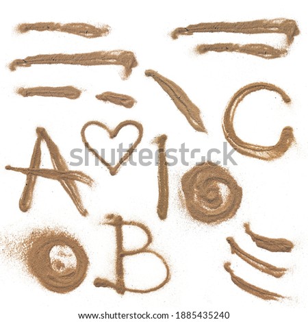 River sand isolated on a white background. letters and items from the sand