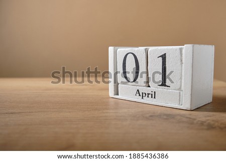 Wooden white small calendar, date 1 April
