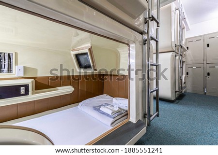 Interior picture of a small mattress of a capsule hotel in Japan