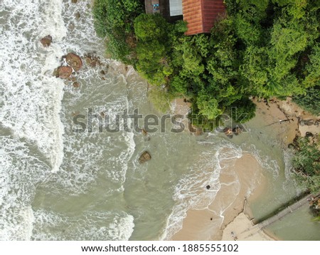 Creative Aerial Shots of the Santubong and Damai Beaches of Sarawak Malaysia, beside the South China Sea, with the mighty Mount Santubong as the background