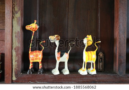 Animal toy decorated at the wooden window