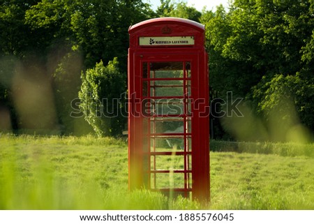 Telephone Booth in the feilds  Royalty-Free Stock Photo #1885576045