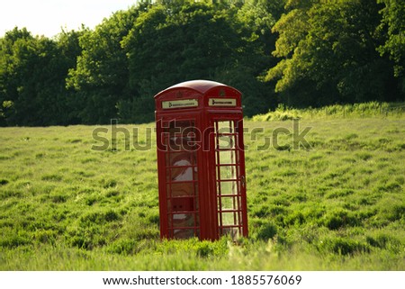 Telephone Booth in the feilds  Royalty-Free Stock Photo #1885576069