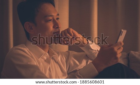 A businessman relaxing at home
