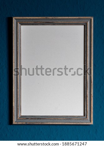 wooden photo frame on wall. cool empty photo placeholder.