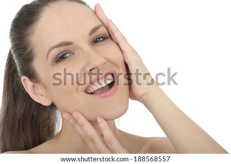 Beautiful Young Woman Applying Face Cream