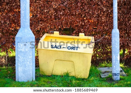 Salt grit yellow container for winter road safety on council road