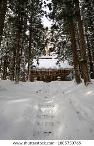 A shrine in the snow in Ouchijuku, Fukushima Prefecture, Japan.
