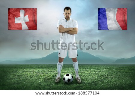 Soccer player stay at field. Game between Switzerland and France national teams.