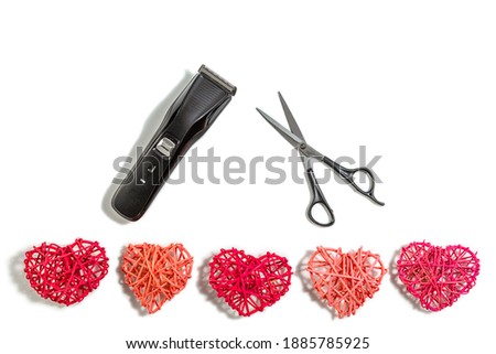 composition with hairdressing tools and colored rattan hearts on a white background. Template for a postcard or information about a hair salon. flat lay, copy space