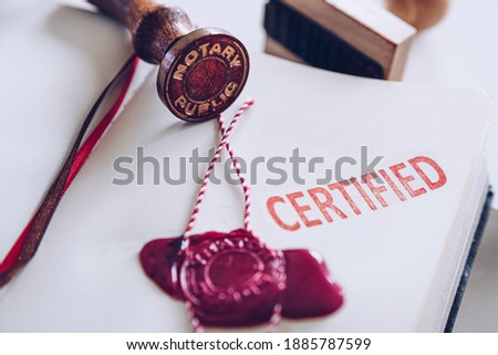 Notary wax seal on the document. Royalty-Free Stock Photo #1885787599