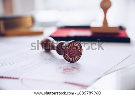Notary stamp on a valid document. Royalty-Free Stock Photo #1885789960