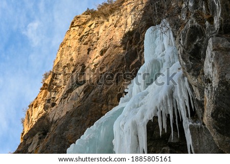 Frozen Butakovsky waterfall in Tian-Shan mountain near Alamty city in Kazakhstan. Best place for climbing, hiking and trekking in Central Asia.