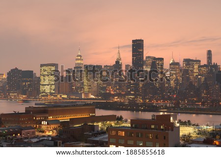 New York, New York, USA cityscape of Midtown Manhattan overlooking Roosevelt Island from Queens.