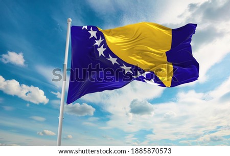 Large Bosnia and Herzegovina flag waving in the wind