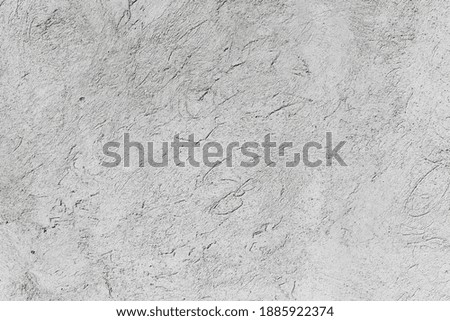 Gray concrete wall with stucco, background photo texture