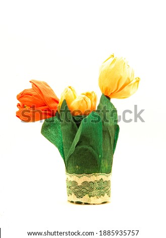 Bouquet of handmade paper flowers on the white background