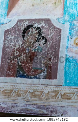 wall painting of an icon in an abandoned orthodox church, bogoroditskaya church of the village of kishino, kostroma district, russia, built in 1821, currently abandoned