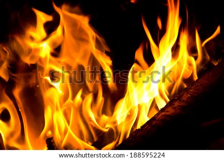 Image with red flame on black background