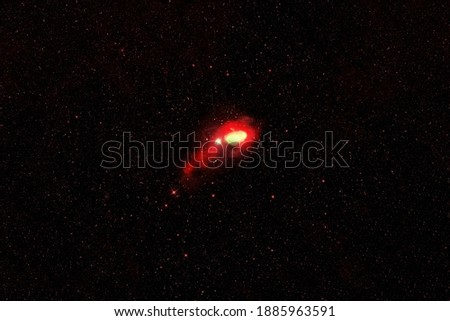 A bright, red galaxy. Elements of this image were furnished by NASA. High quality photo