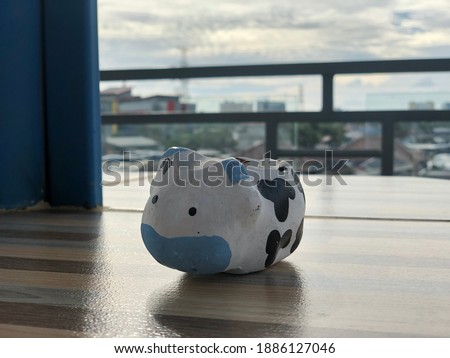 a Cow Statue in Table