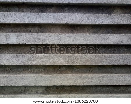 cement wall with a vertical texture