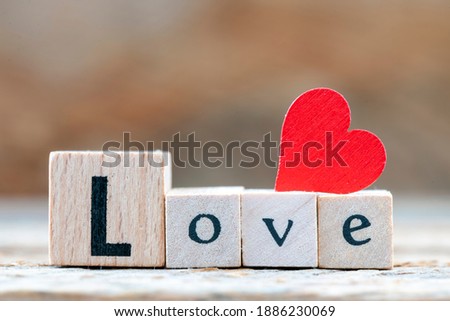 The word love arranged from wooden letters. Valentine's Day on February 14.