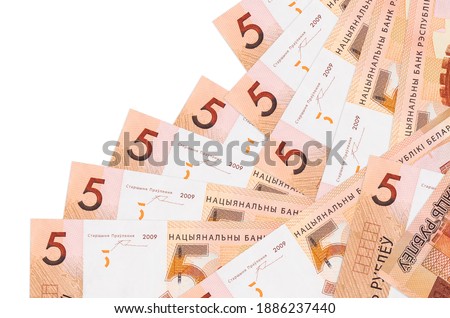 5 Belorussian rubles bills lies in different order isolated on white. Local banking or money making concept. Business background banner