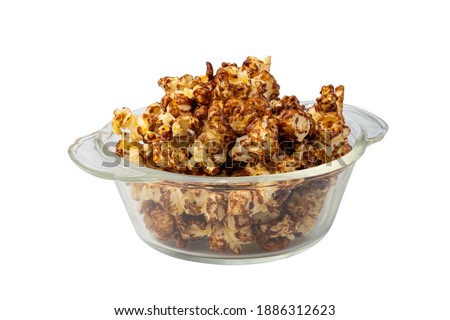 Chocolate popcorn in glass bowl isolated on white background with clipping path