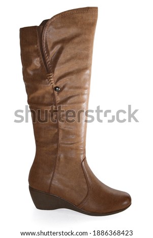 Long women's boots. On a white background. side view.
