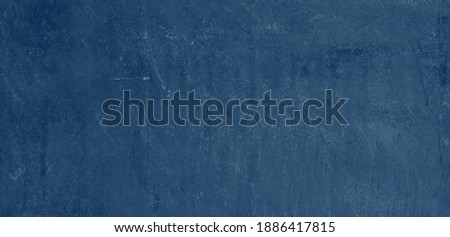 Shaded Blue speckled hand-painted illustration texture design of old distressed vintage grunge concrete with stains. damaged textured abstract washed cement backdrop as web banner background. Royalty-Free Stock Photo #1886417815