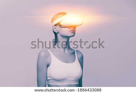 immersive VR concept. a virtual reality helmet on a woman's head