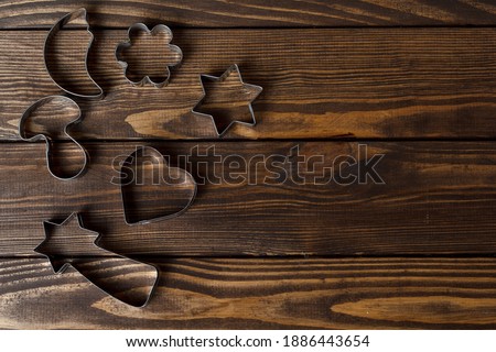 cookie cutters. Cook at home. cookie cutters on a wooden background.